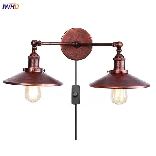 Rustic copper industrial vintage double wall light with two exposed Edison bulbs and black toggle switch for bedroom decorbites