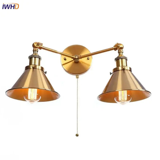 Brass double arm wall light with conical shades and exposed filament bulbs for decorbites industrial vintage bedroom decor