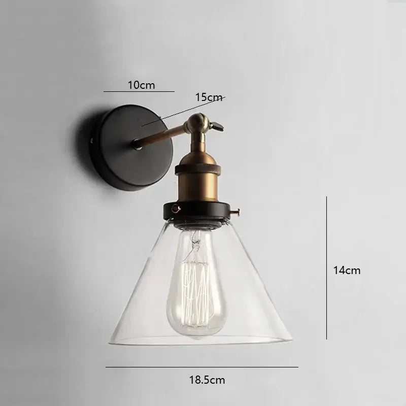 Industrial vintage loft wall lamp with black base brass arm and clear glass shade for decorbites industrial vintage decor