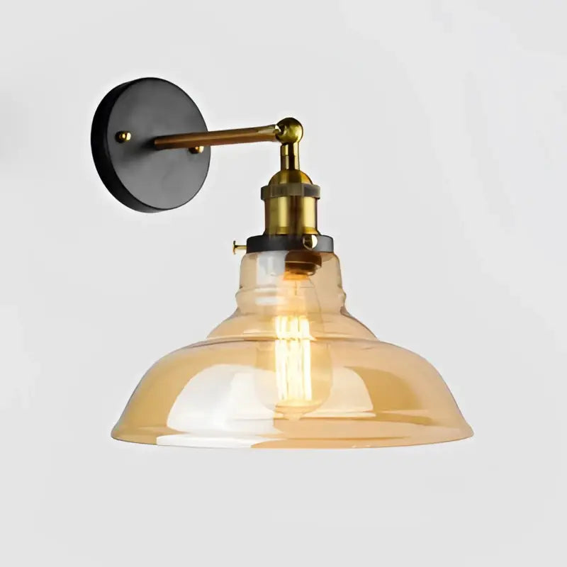 Industrial vintage loft wall lamp with brass metal arm and amber-tinted glass shade for bedroom decorbites industrial vintage style