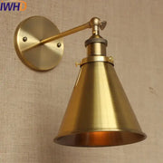 Brass-finished industrial vintage wall lamp with conical shade and adjustable arm by decorbites for bedroom decor