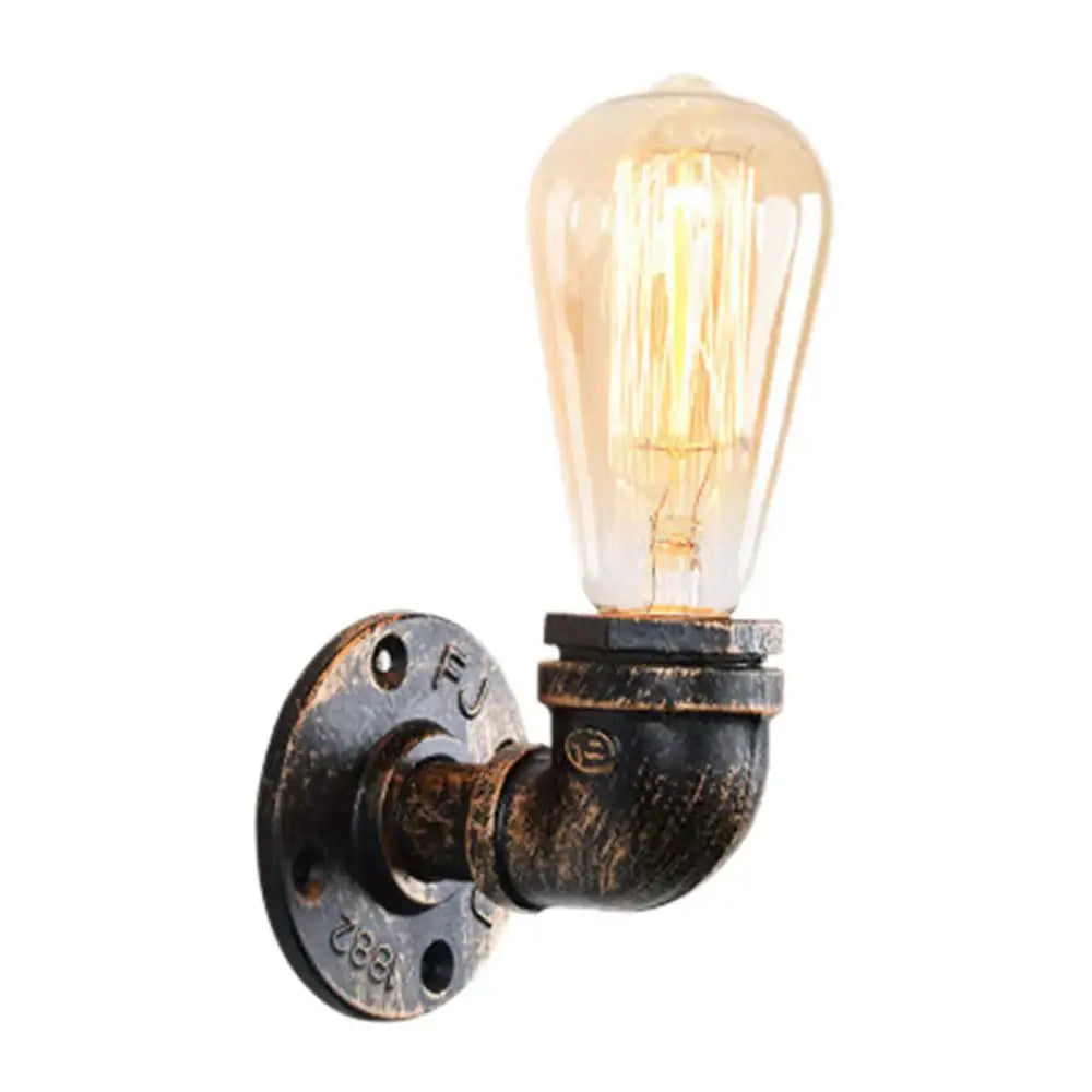 Industrial water pipe wall sconce kitchen light in black and brass with vintage edison bulb and distressed metal piping decorbites industrial water