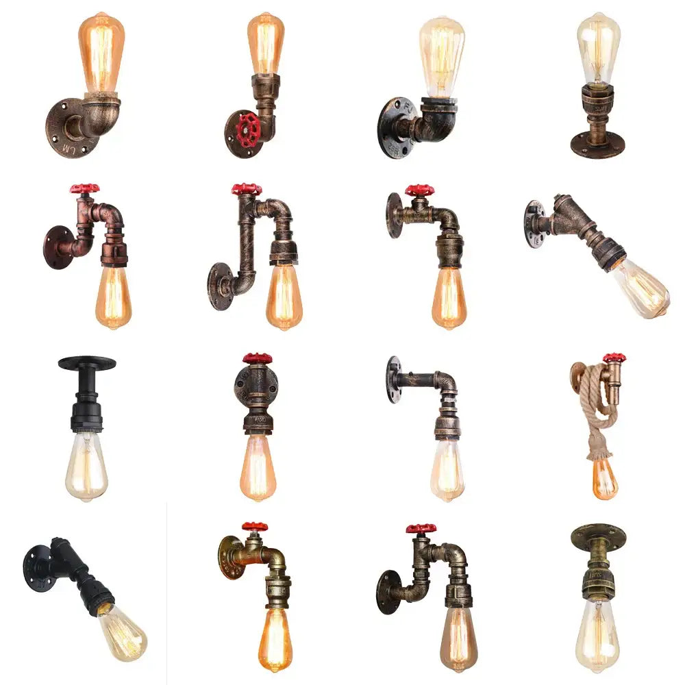 Industrial water pipe wall sconce kitchen light in black and brass with vintage brass fittings red valve handles and edison bulbs