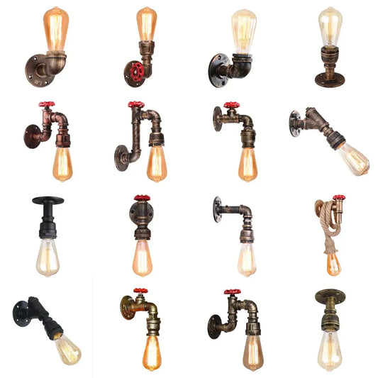 Industrial water pipe wall sconce kitchen light in black and brass with vintage brass fittings red valve handles and edison bulbs