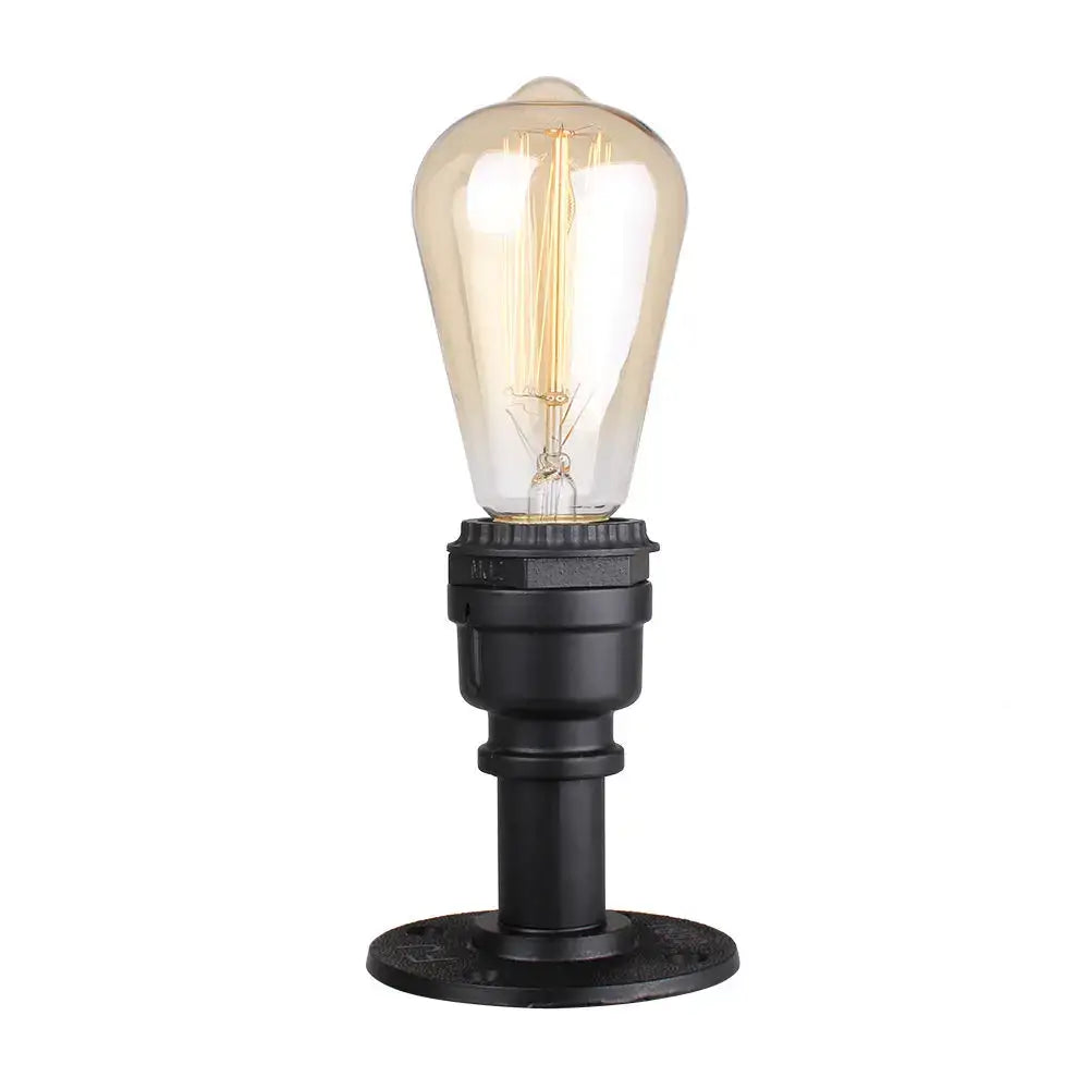 Industrial water pipe wall sconce kitchen light in black and brass with a clear glass bulb and visible filament decorbites industrial water