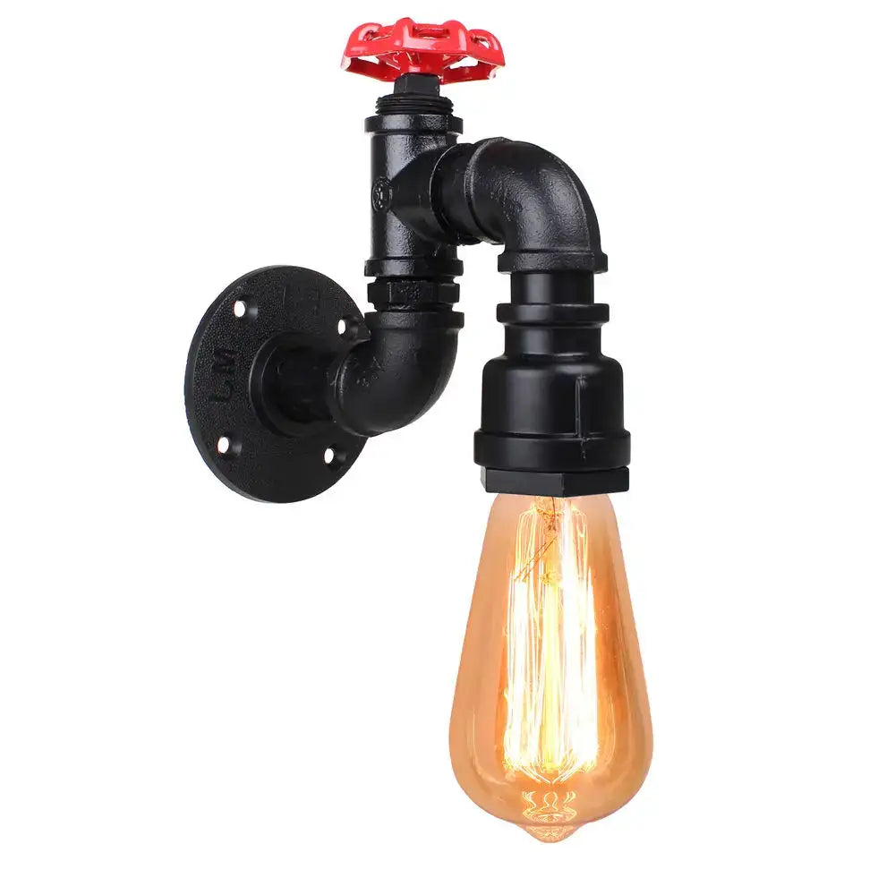 Industrial water pipe wall sconce in black and brass with red valve handle and glowing amber filament bulb decorbites industrial water