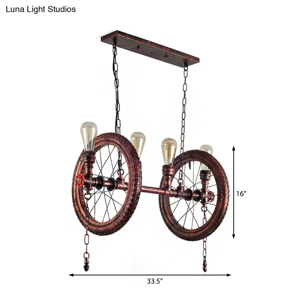 DecorBites industrial hanging light kit with weathered copper bicycle wheel design and vintage Edison bulbs for dining room island