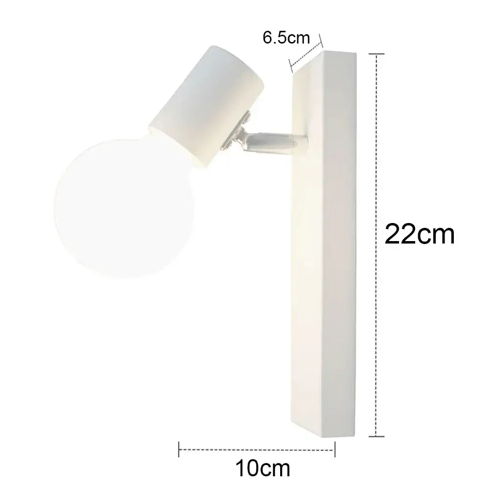 White minimalist wall sconce with cylindrical head and sleek rectangular base for decorbites industrial led wall lighting