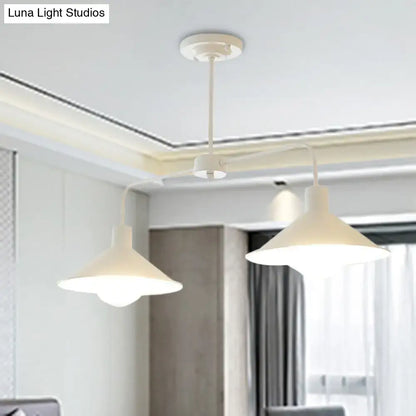 White decorbites™ industrial conic pendant light with angle arm in black and white metal for kitchen island lighting