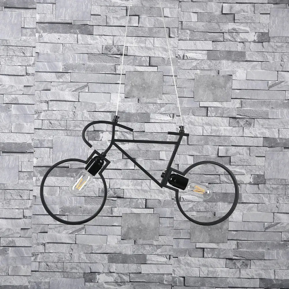 Black metal iron bicycle pendant light with exposed filament bulbs for industrial living room decor by decorbites