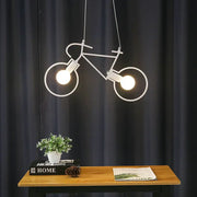 White metal iron bicycle pendant light with two glowing bulbs for industrial living room decor by decorbites