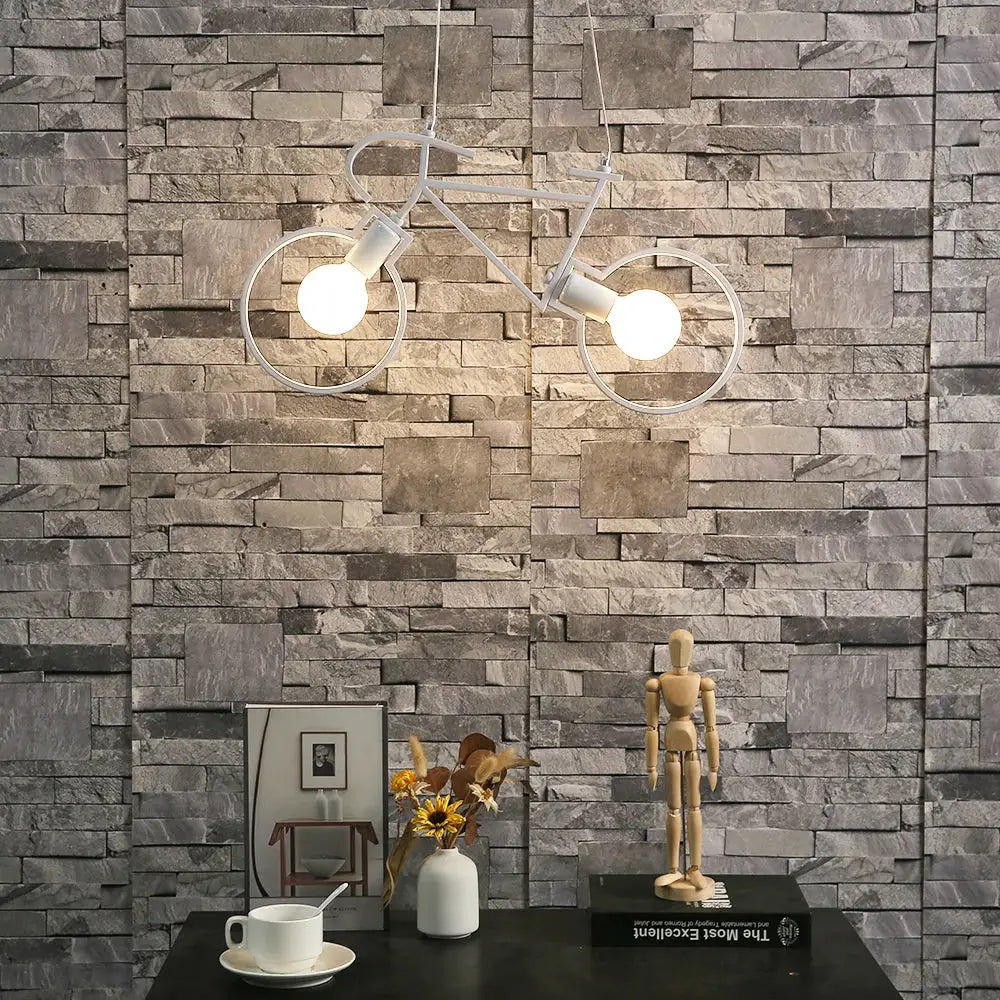White iron bicycle pendant light with two exposed bulbs for industrial living room decor by decorbites iron bicycle
