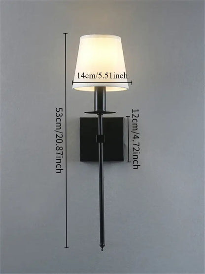 Black metal wall lamp with white fabric lampshade and brass finish from decorbites industrial white wall collection