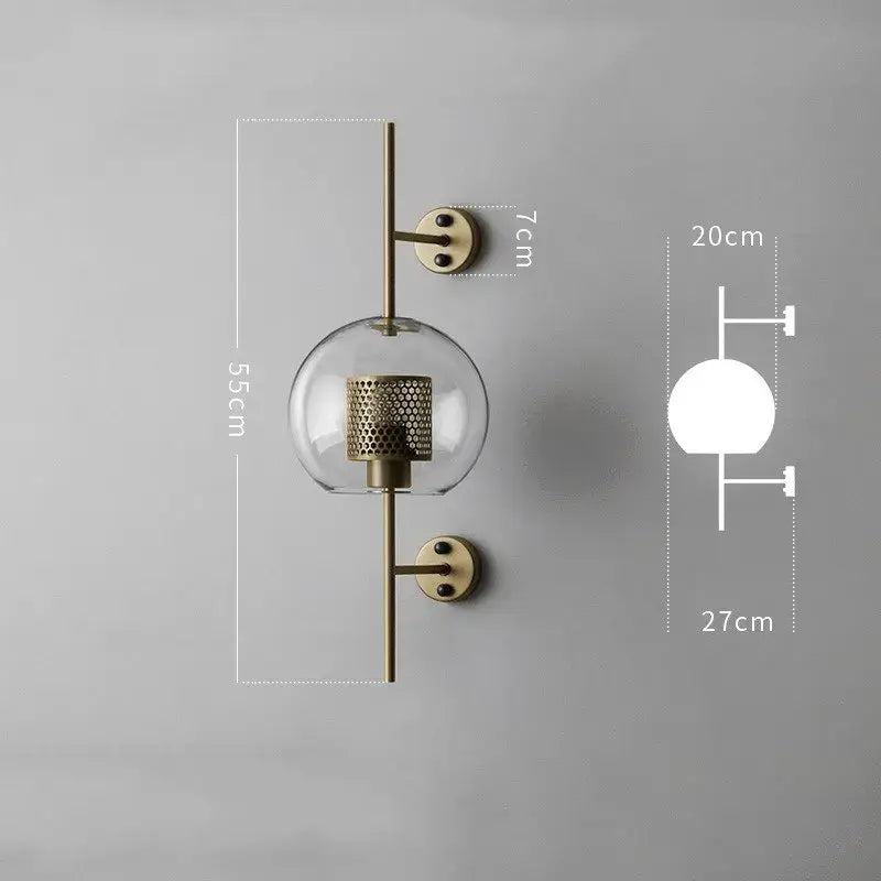 Brass-finished industrial wind grid wall lamp with clear glass globe and perforated metal shade for living room decorbites industrial wind