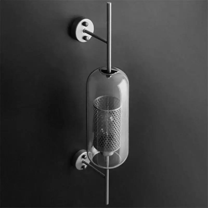 Modern minimalist industrial wind grid wall lamp with clear glass cylinder and brass perforated mesh decorbites industrial wind