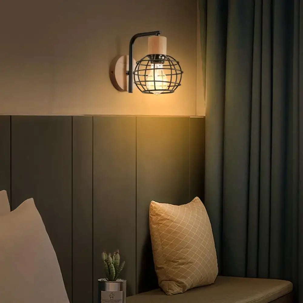 Industrial wire cage wall sconce with black metal cage warm bulb and wooden backplate for decorbites bedroom light fixtures