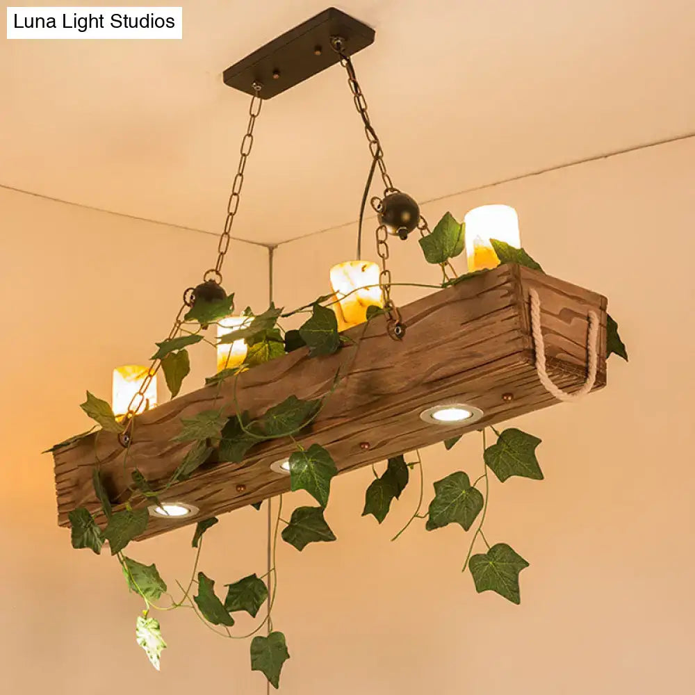 Rustic wooden beam dining room chandelier with integrated e26 e27 candle lights and trailing green ivy vines fixture width