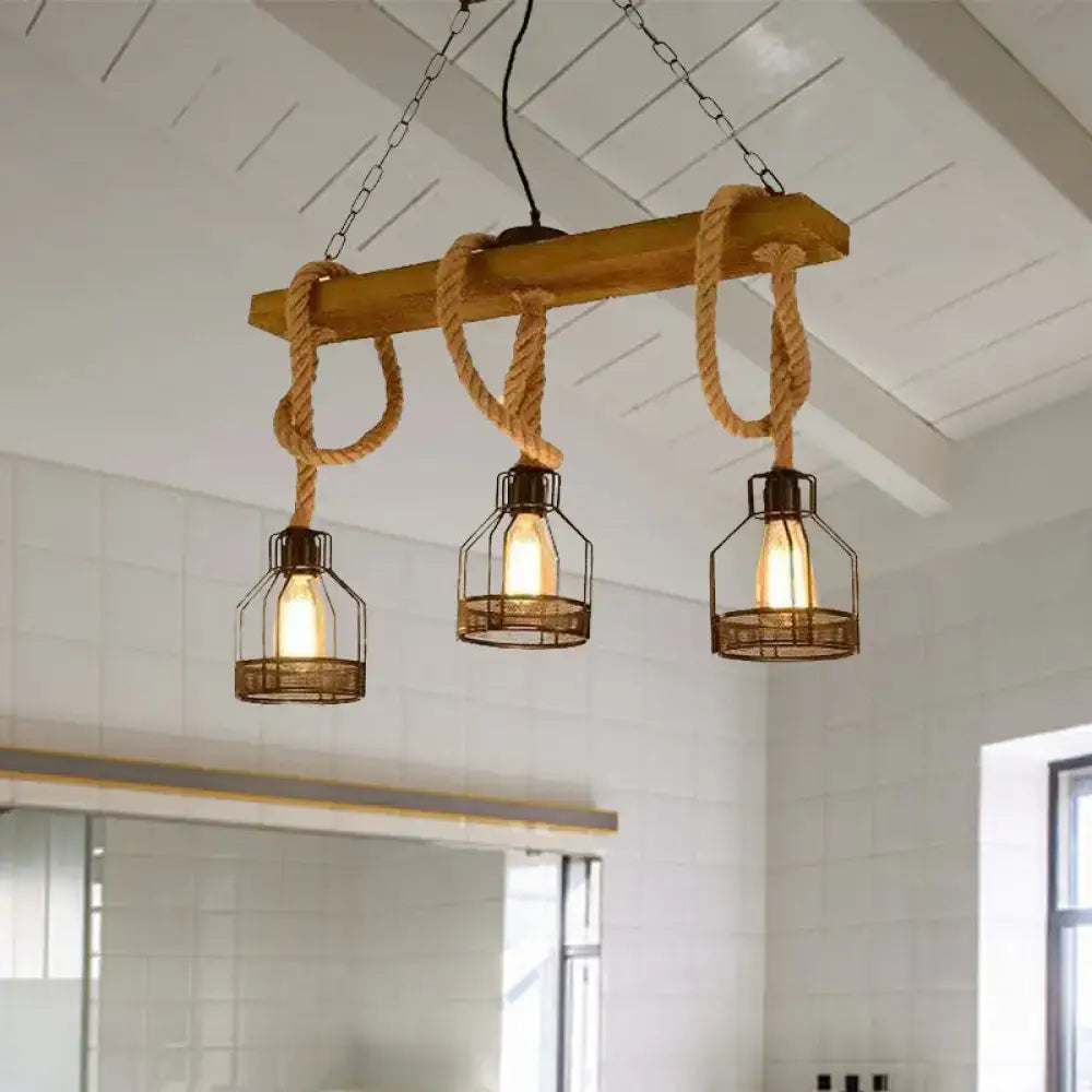 Industrial wood and rope caged restaurant island lighting with black pendant chandelier featuring edison bulbs in wire cages