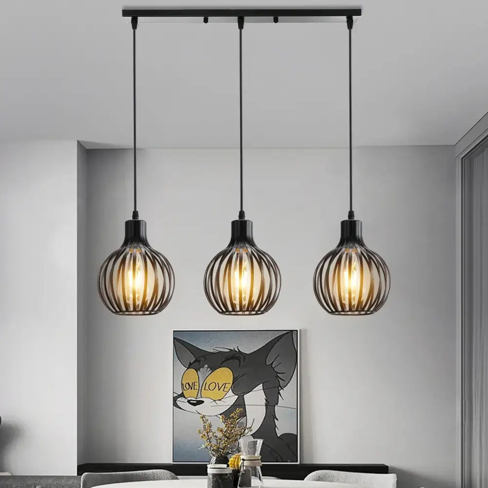Black metal industrial wood pendant light with vertical wire cage design and warm glowing bulbs for dining room decorbites industrial wood