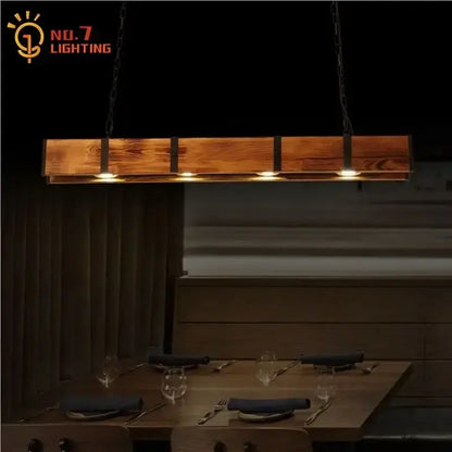 Rustic wooden rectangular industrial wood pendant light with black metal accents and four warm bulbs for dining room decorbites industrial wood pendant