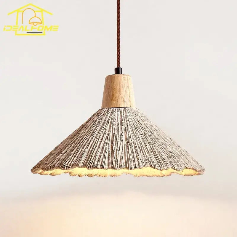 Industrial woven concrete pendant light with a rustic wood top and textured gray shade by decorbites concrete emits warm glow
