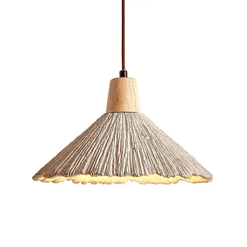 Warm-toned industrial woven concrete pendant light with textured shade and natural wood top for kitchen decorbites concrete pendant