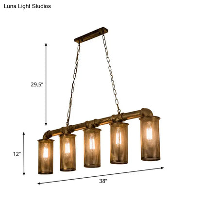 Industrial-style pendant light with a brass-finished wrought iron pipe frame and five amber glass cylinders bulb base 110v-120v