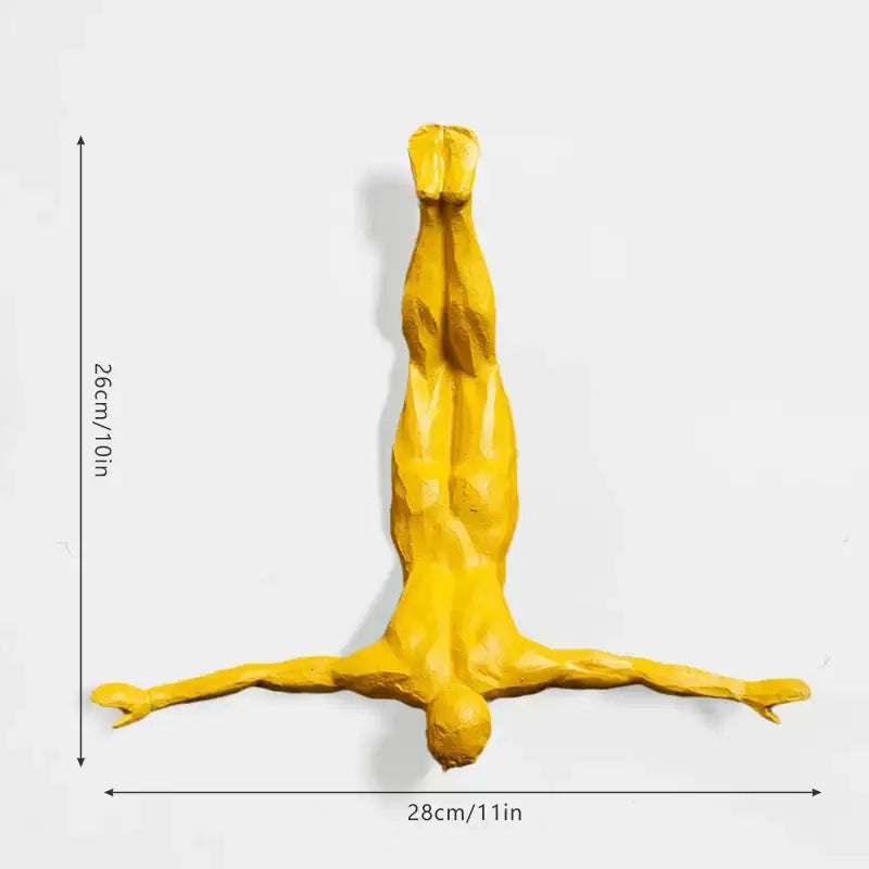 Vibrant yellow industrial bungee jumper wall sculpture featuring an inverted human figure for living room decorbites bungee jumper decor