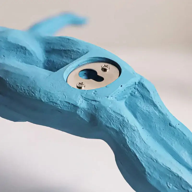 Blue textured ceramic decorbites bungee jumper wall sculpture with metallic keyhole and screws for living room decor