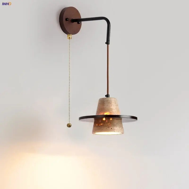 Industrial yellow travertine wall lamp with pull chain switch featuring beige concrete shade and black metal arm for bedroom