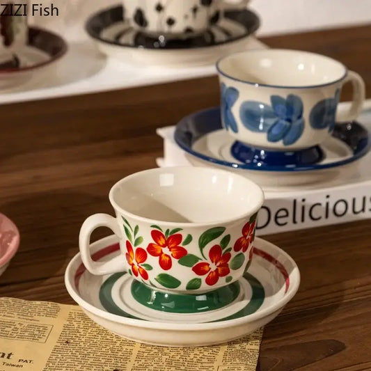White ceramic ink flowers ceramic cup and saucer set with hand-painted red and green floral design for dining room decorbites ink flowers