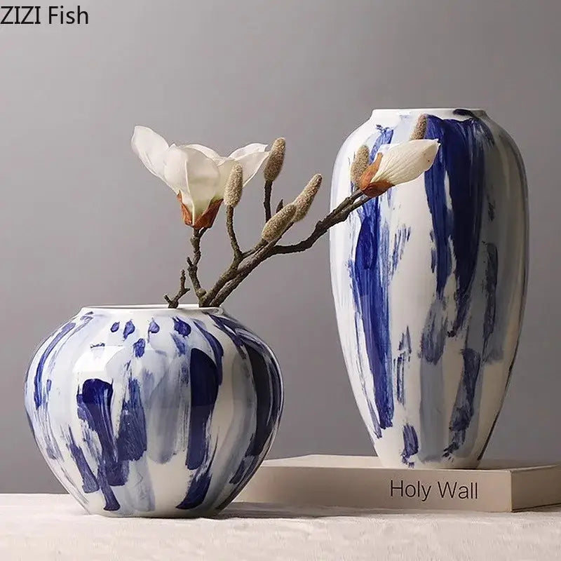 Two ceramic vases with ink style blue and white brushstroke patterns for living room decor featuring ink style flowers