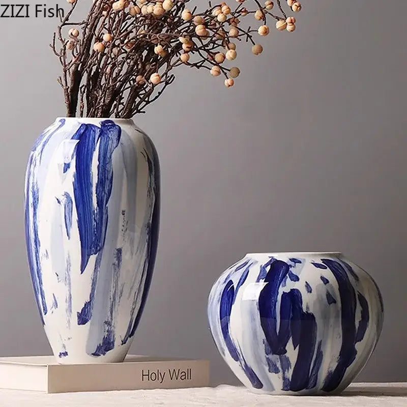 Two ceramic vases with bold blue and white ink style brushstroke patterns for living room decor