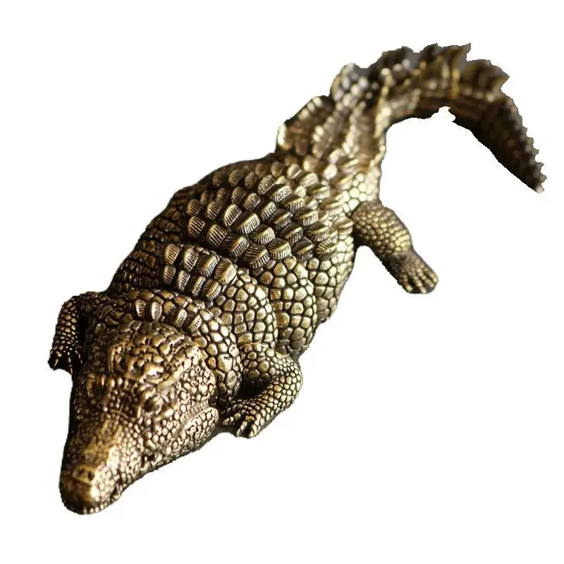 Intricate decorbites brass crocodile sculpture in bronze with detailed scales and lifelike pose for living room decor
