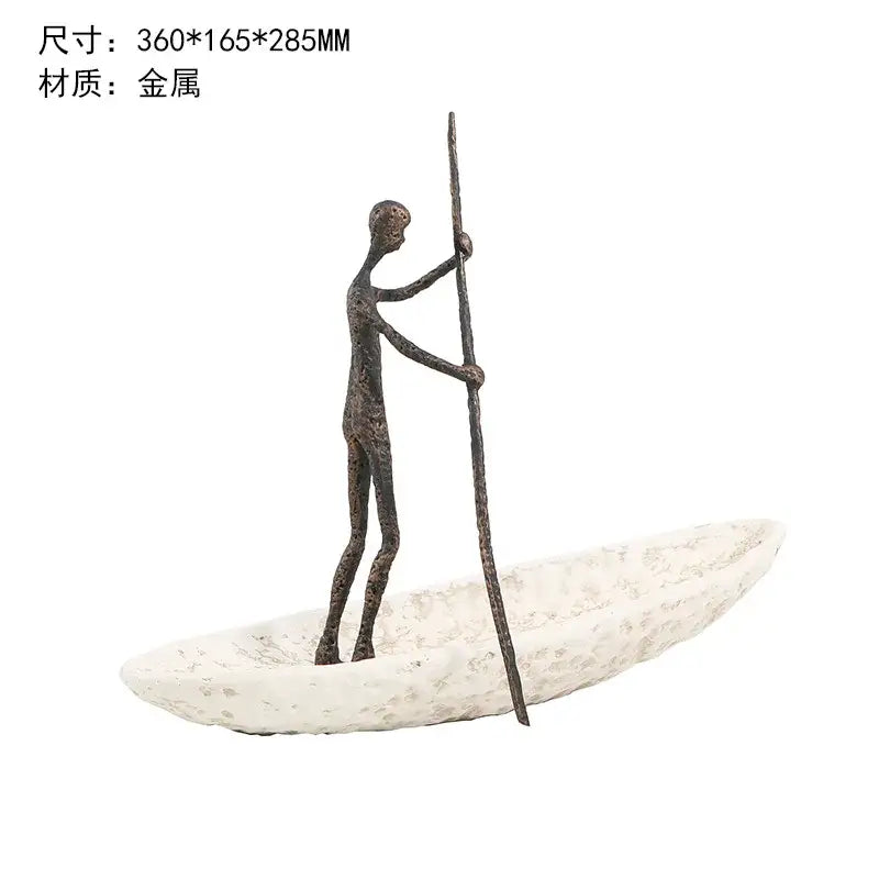 Bronze-colored metal horse decoration featuring a stylized figure on a textured white boat holding a long pole