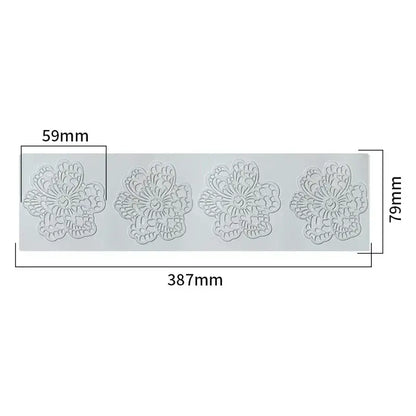 Light gray silicone mold with four intricate lace-like floral designs for decorbites coral branch leaf detail