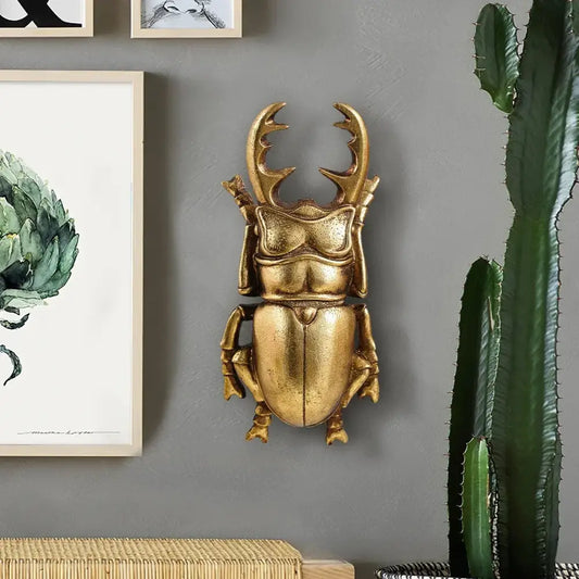 Intricate golden beetle resin wall decor with metallic finish for living room featuring detailed beetle resin handicrafts design