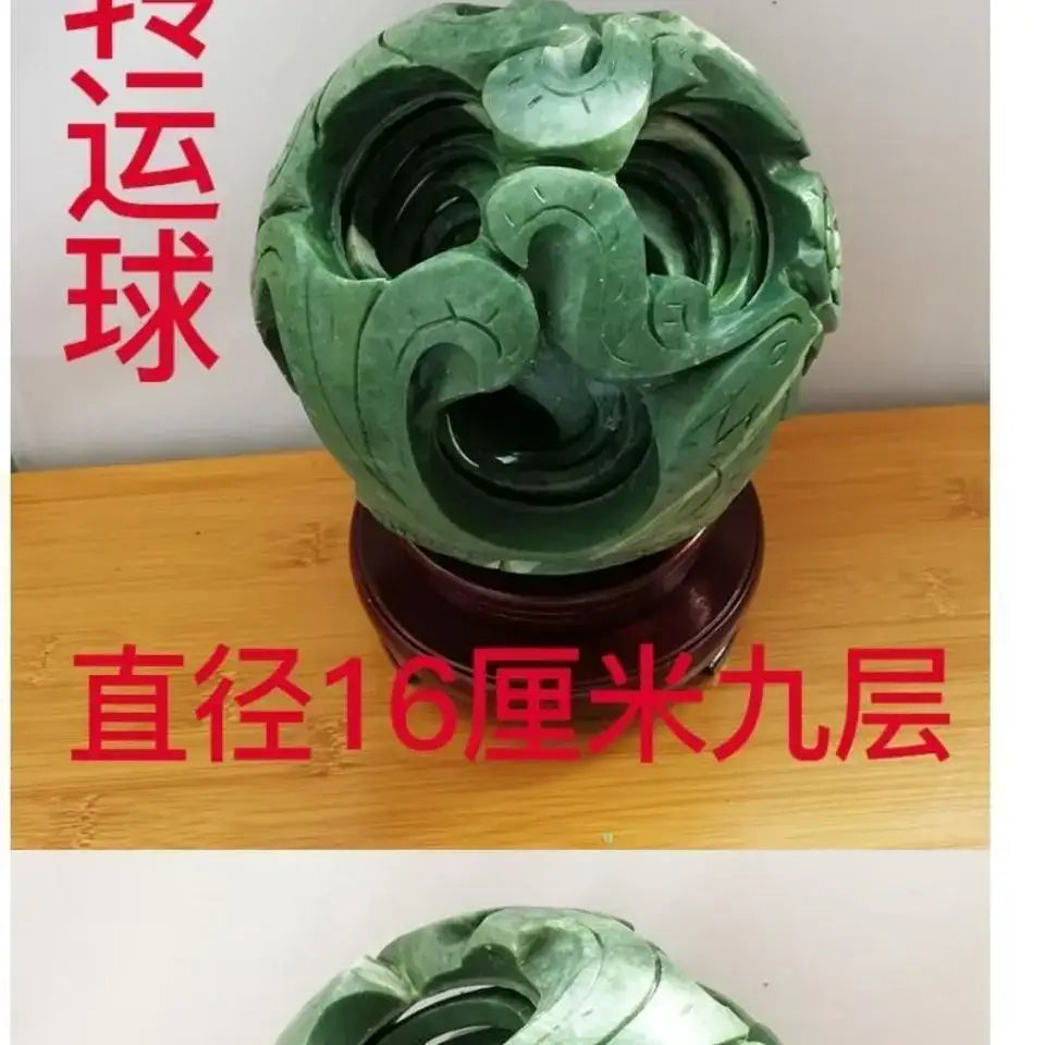 Intricate green jade stone dragon phoenix ball with swirling patterns and polished finish for living room decor