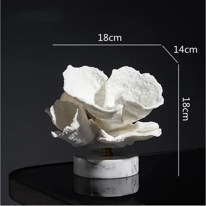 White ceramic coral resin ornaments with marble base for living room decor featuring intricate glossy design