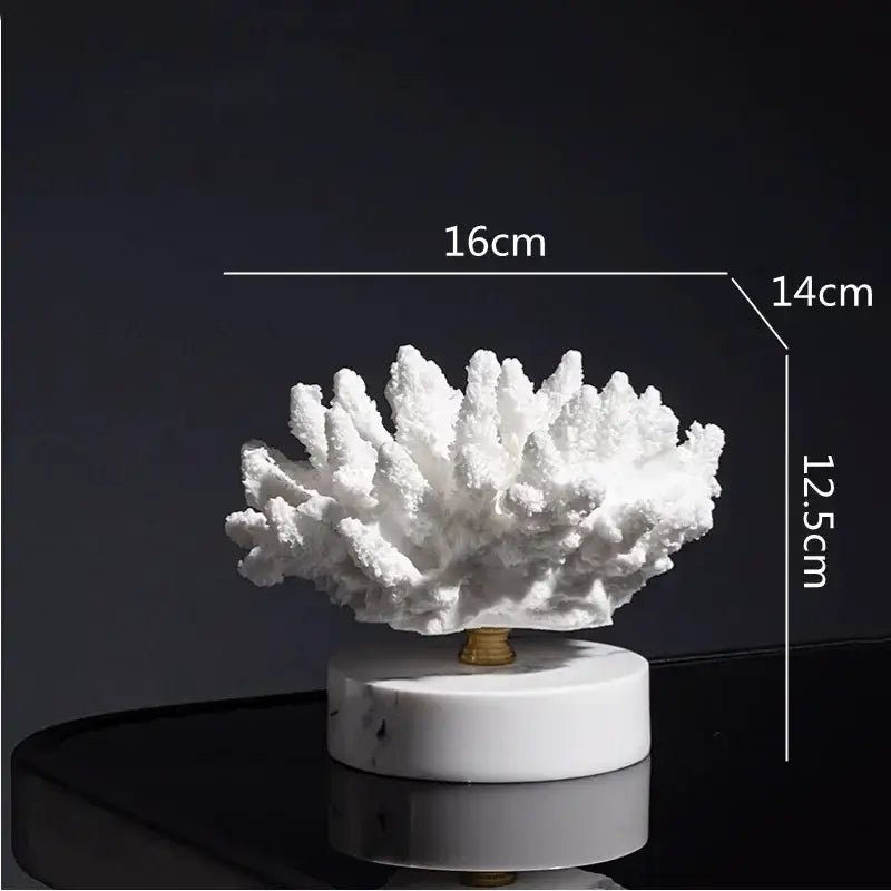 White coral resin ornaments with intricate branching details mounted on a polished white marble base for living room decor