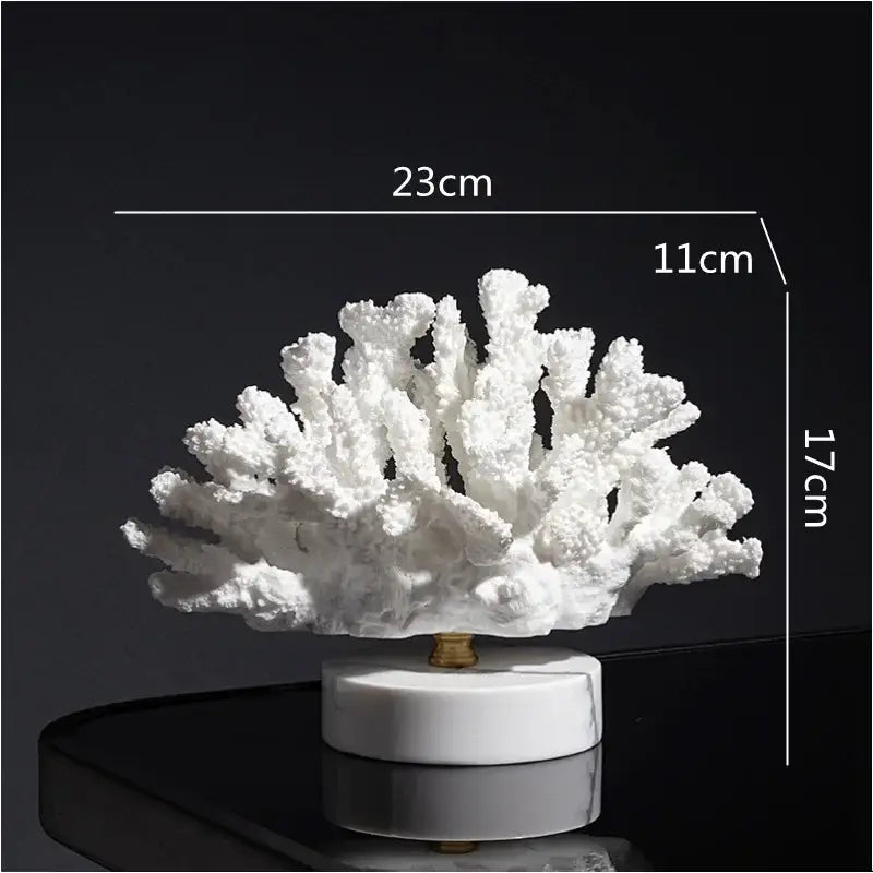 White coral resin ornaments with intricate textured branching design mounted on a white marble base for living room decor
