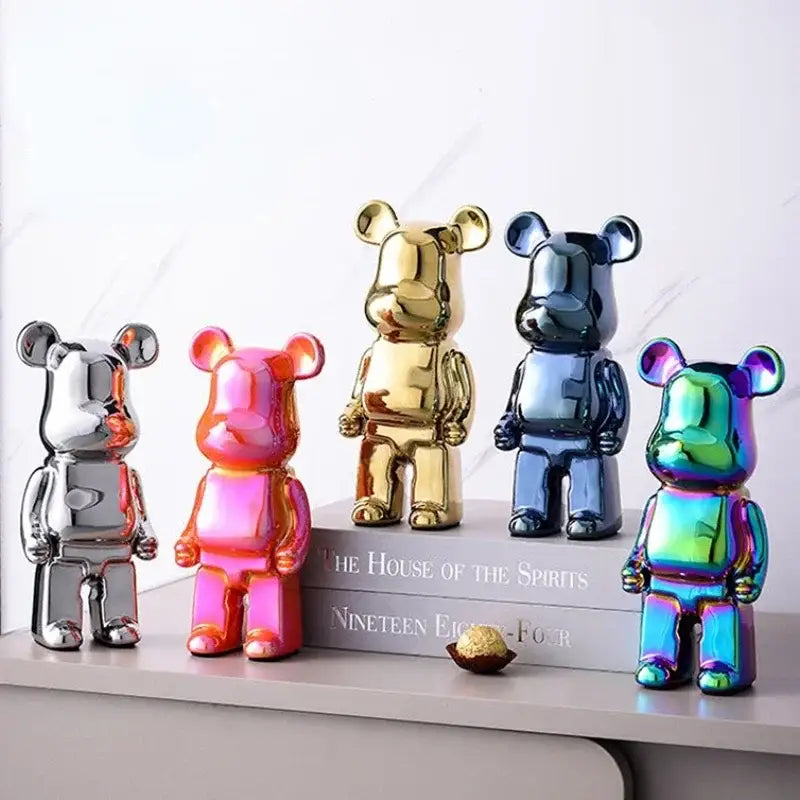 Set of five glossy iridescent bear piggy banks in silver pink gold blue and rainbow for bear tv cabinet decor