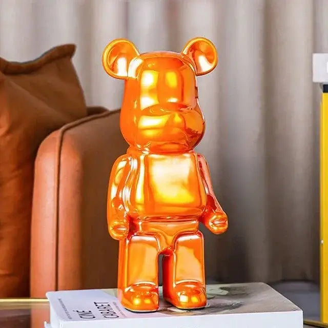 Orange translucent bear piggy bank with glossy finish as iridescent cabinet sculpture decor for living room or tv cabinet