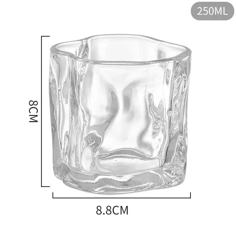 Clear glass cup with textured wavy surface and rounded edges from decorbites iceberg glass cup dining set