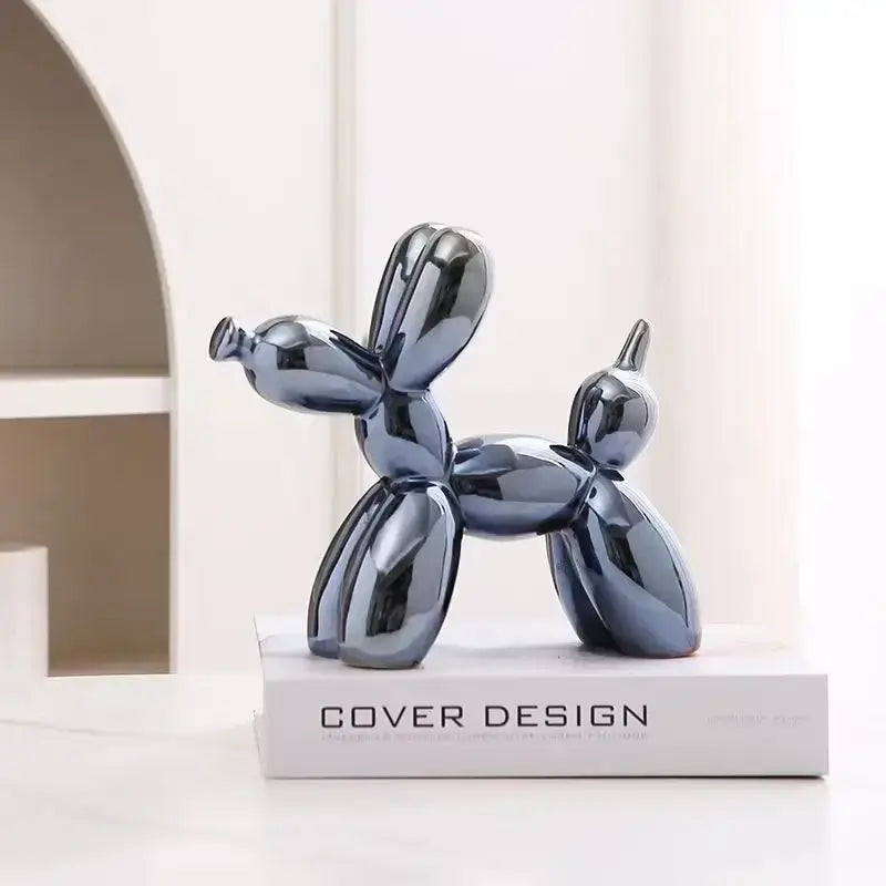 Shiny dark blue balloon dog ceramic sculpture with iridescent glossy finish for living room decor
