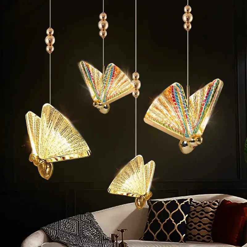 Iridescent gold butterfly pendant lights with rainbow wings and metallic accents for living and dining rooms