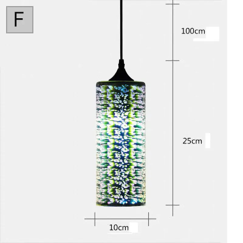 Cylindrical glass pendant light with vibrant green and blue iridescent starburst pattern for living room decor