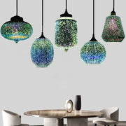 Iridescent starburst glass pendant lights with swirling green blue and purple hues for living room decor