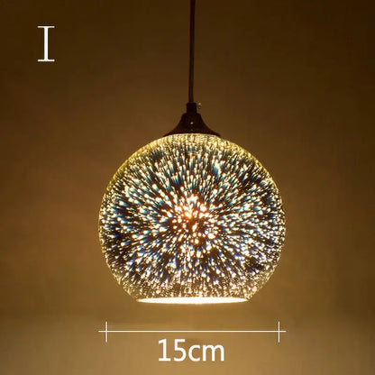 Irrescent starburst glass pendant lights featuring a spherical glass pendant with blue and gold speckles for living room decor