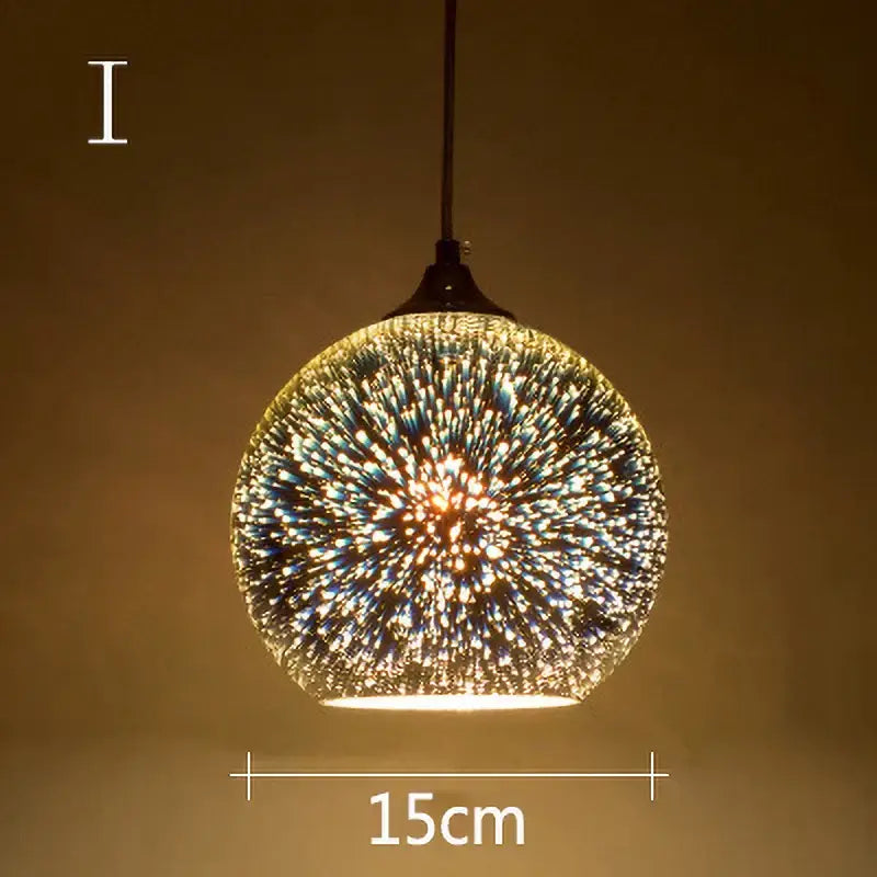 Irrescent starburst glass pendant lights featuring a spherical glass pendant with blue and gold speckles for living room decor